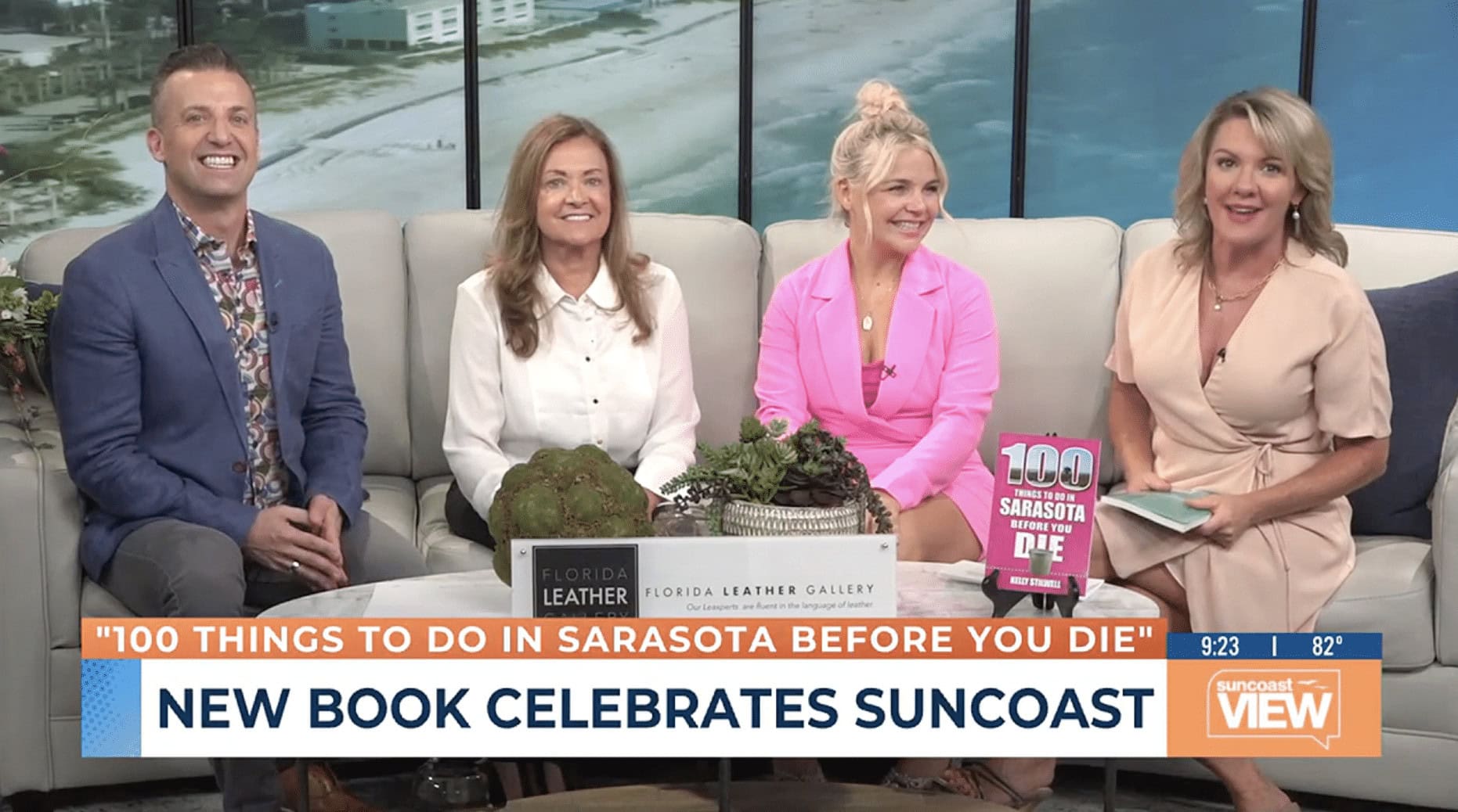 Four people sitting on couch for television show.